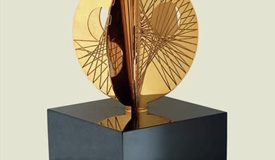 Picture of a sculpture on a stand.