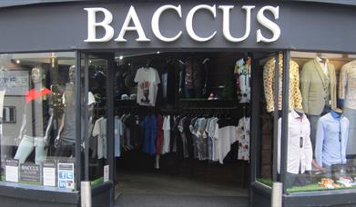 Baccus shop front displaying shirts and t-shirts