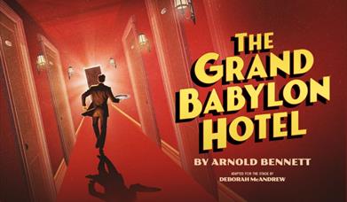 Drawing of a waiter walking down a hotel corridor carrying a tray.