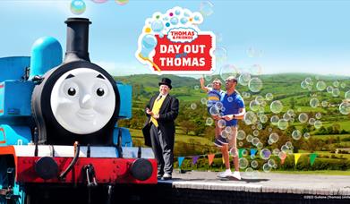 Image shows Thomas the Tank Engine with the words "Day out Thomas"