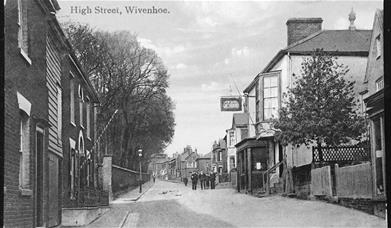 Black & White postcard of the Greyhound Pub Wivenhoe. Photo credited to Wivenhoe Memories Collection