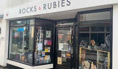 Shop front of Rocks and Rubies with rocks in the window