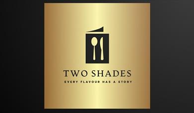 Two Shades logo, showing an image of a spoon and knife on a gold background