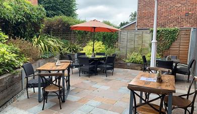 Outside seating area for Coastal Coffee.