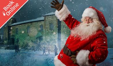 Father Christmas standing in front of Colchester Castle